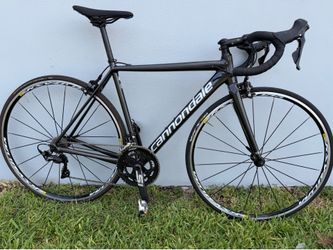 🚴🏻Cannondale CAAD12 Road Bike – Size 50  The Cannondale CAAD12 is one of the most respected high-performance aluminum road bikes ever built. With it