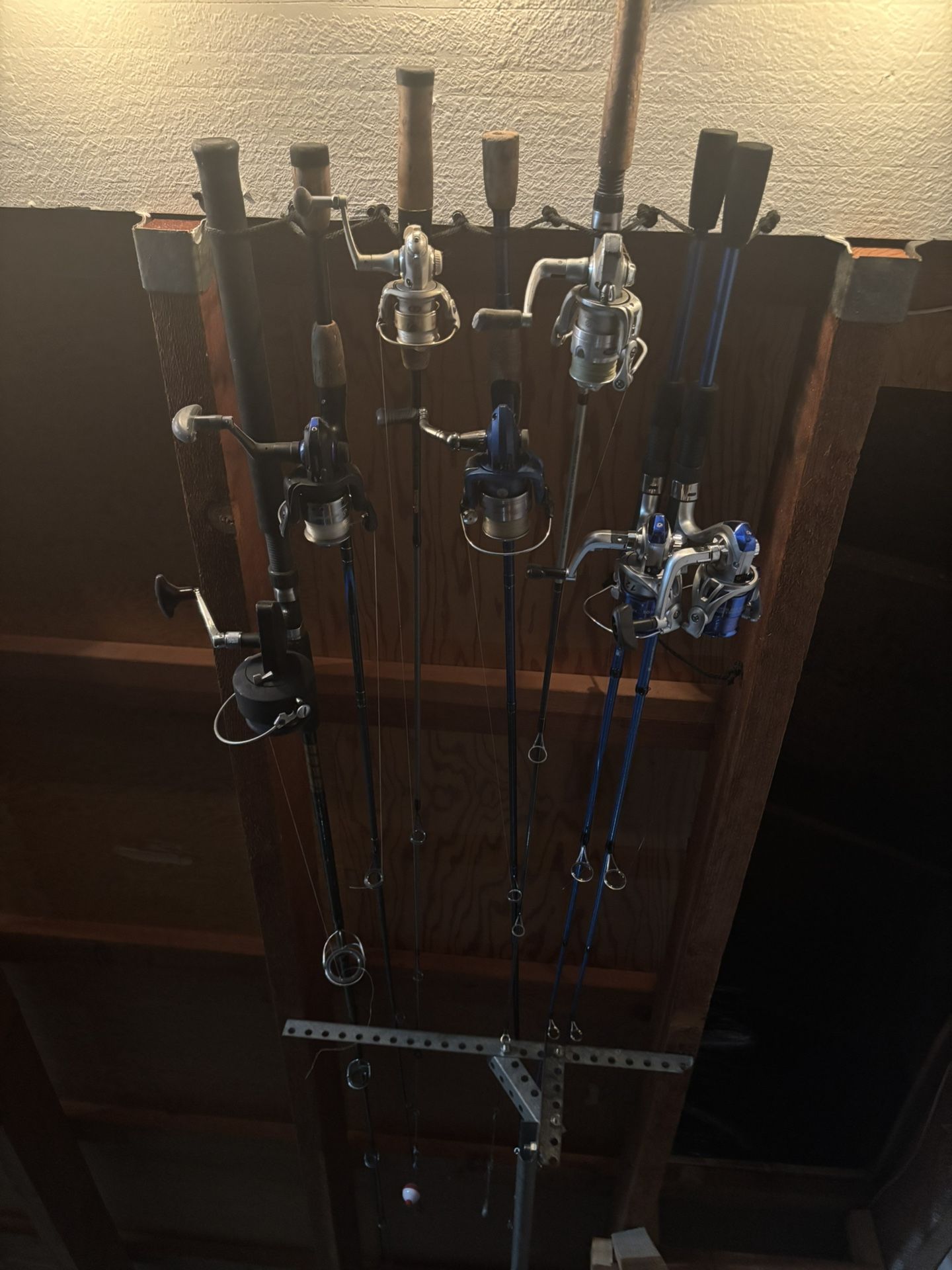 7 Fishing Rods and Box with Fishing Items