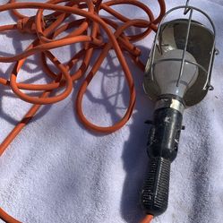 Work trouble light, also known as a drop light or inspection lamp, designed to illuminate