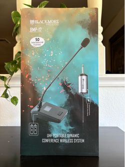 Portable wireless conference microphone system