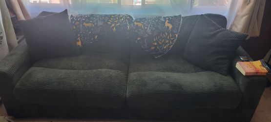 Dark green corduroy couch