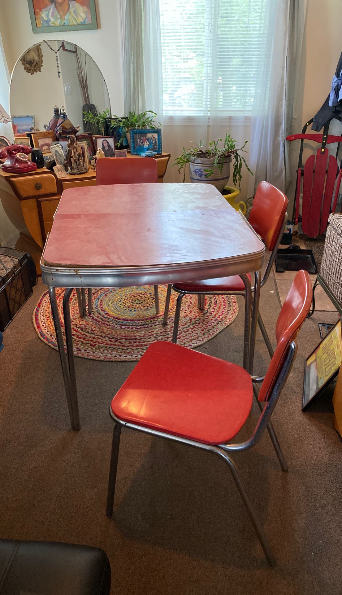 Retro 50s table and chairs four chairs a table extension three chairs are in good shape one needs a back rest also one kitchen stepping stool seat al