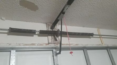 Garage Door Broken Spring Opener Off Track Replace Adjustment And Parts 
