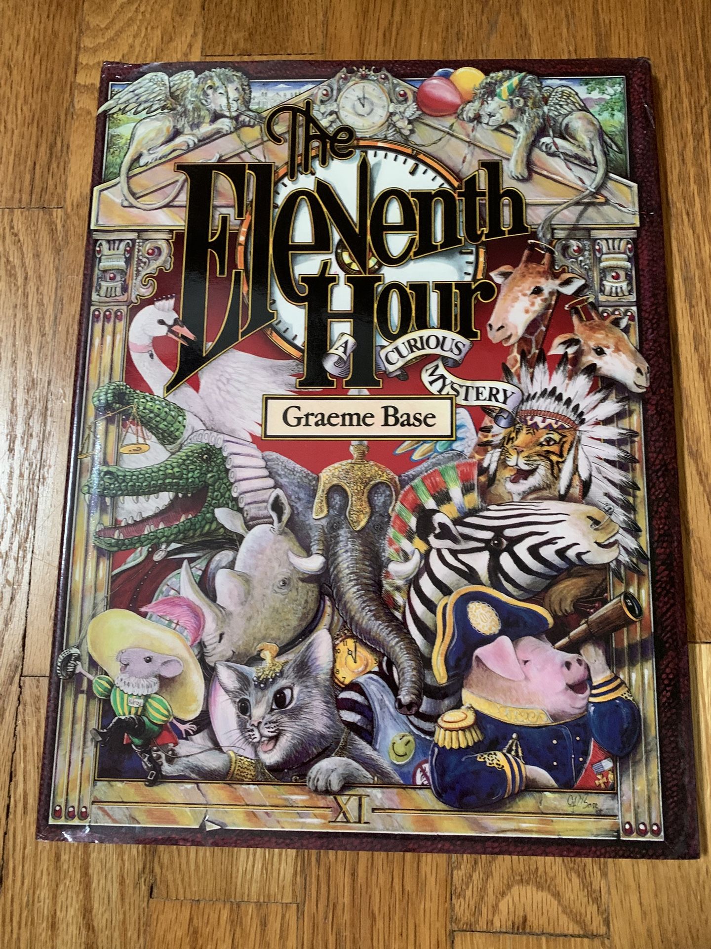 The Eleventh Hour by Graeme Base, Gorgeous Illustrated Hardcover Mystery
