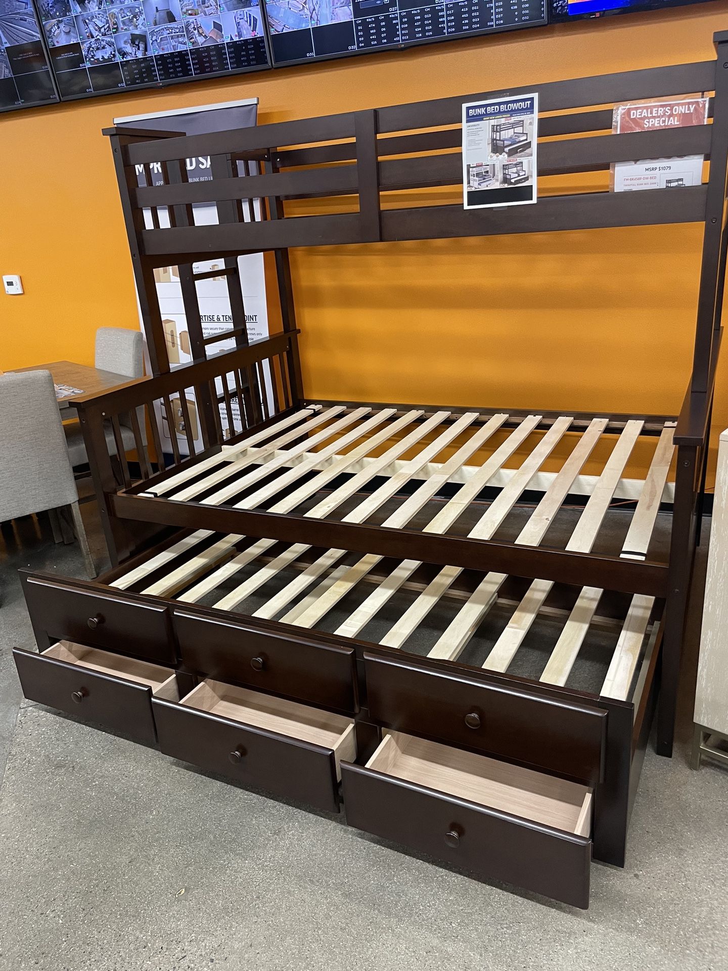 Twin/full bunk bed with twin drawer trundle. $499 without mattresses. $775 with 3 mattresses. 3 colors walnut, white, grey. Assembly required. Assembl