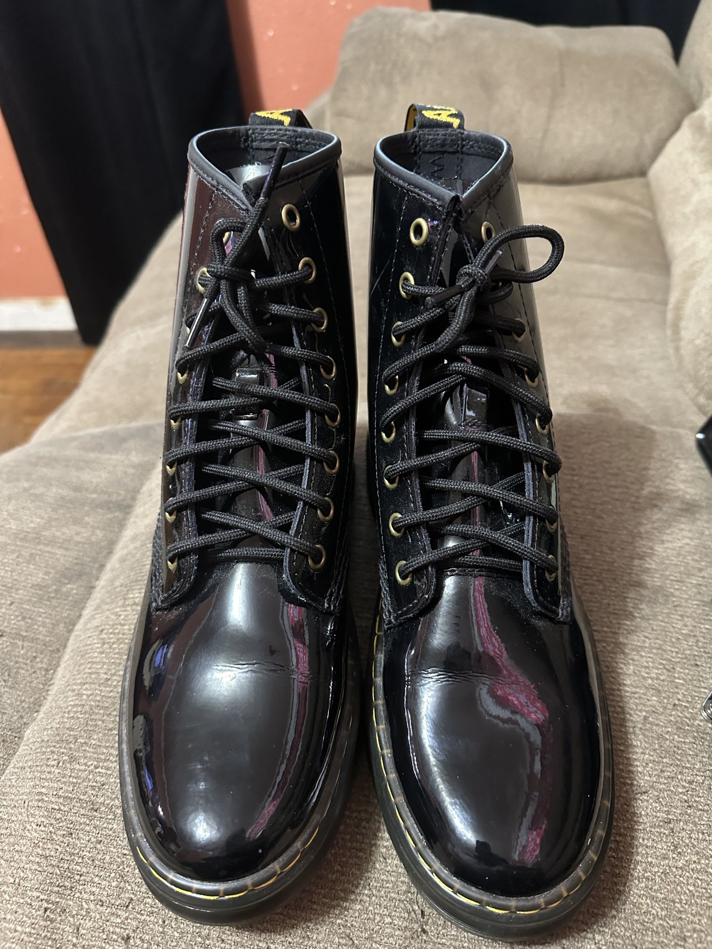 Dr. Martens 1460 8 Eye Patent Boots.