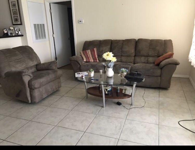 Sofa with one recliner in both size and the recliner. (Rocking chair )