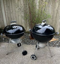 Two Weber Charcoal Grills