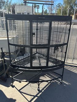Corner bird cage