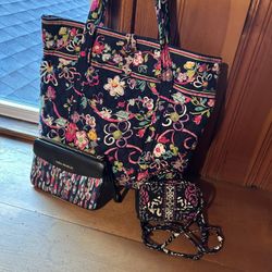 Vera Bradley: Tote $20  Wristlet $5. Shoulder $5