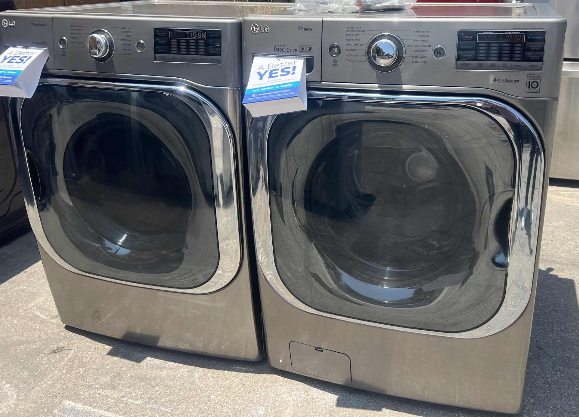 LG STAINLESS STEEL WASH AND DRYER