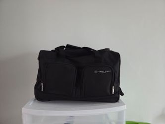 Rolling duffel suitcase