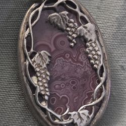 Silver Wrapped Around Unique Precious Stone