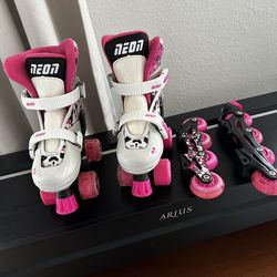 Girls adjustable rollerblades size 12–2. Very good condition, smooth wheels, clean.