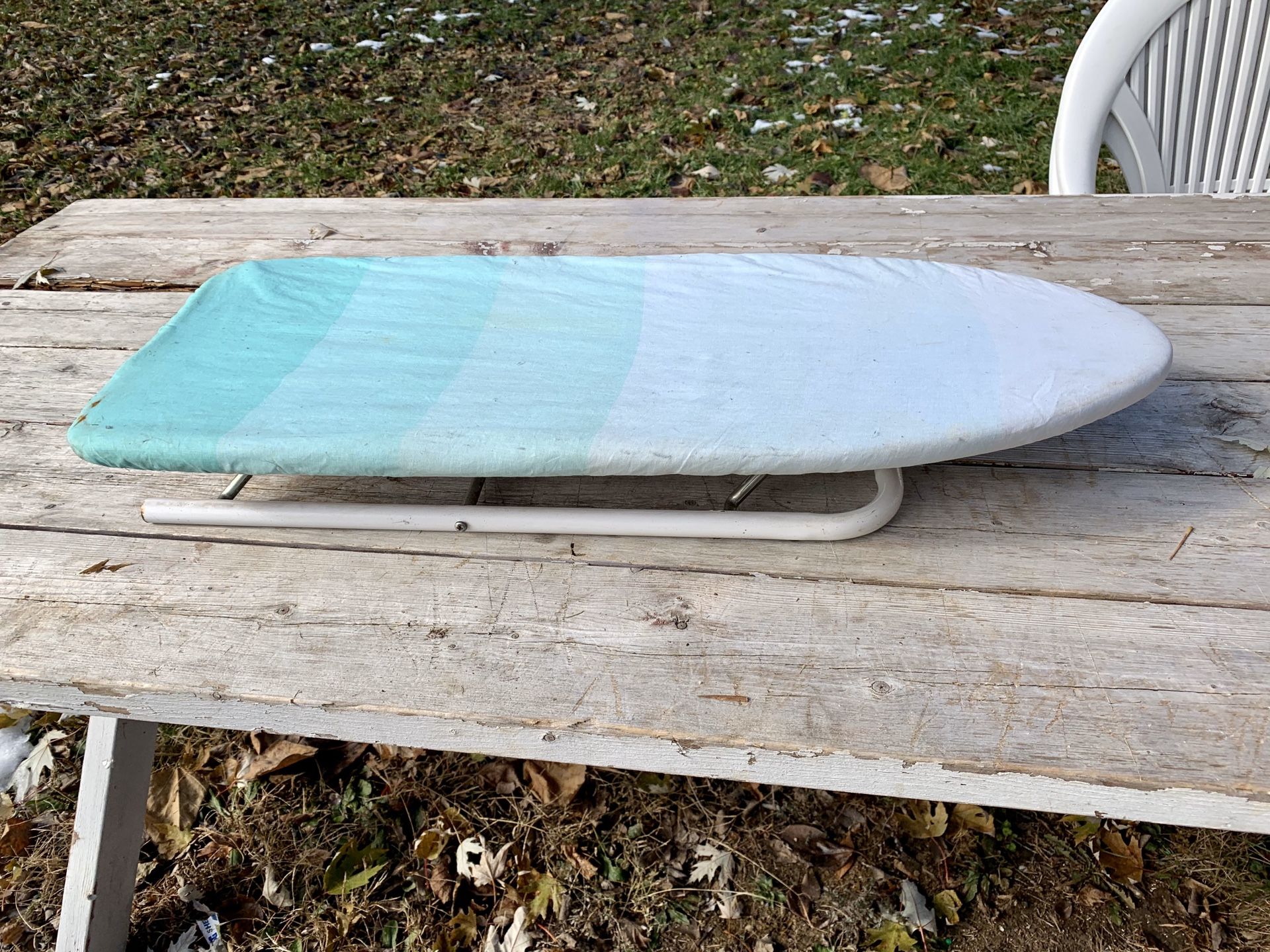 Table top ironing board with cover