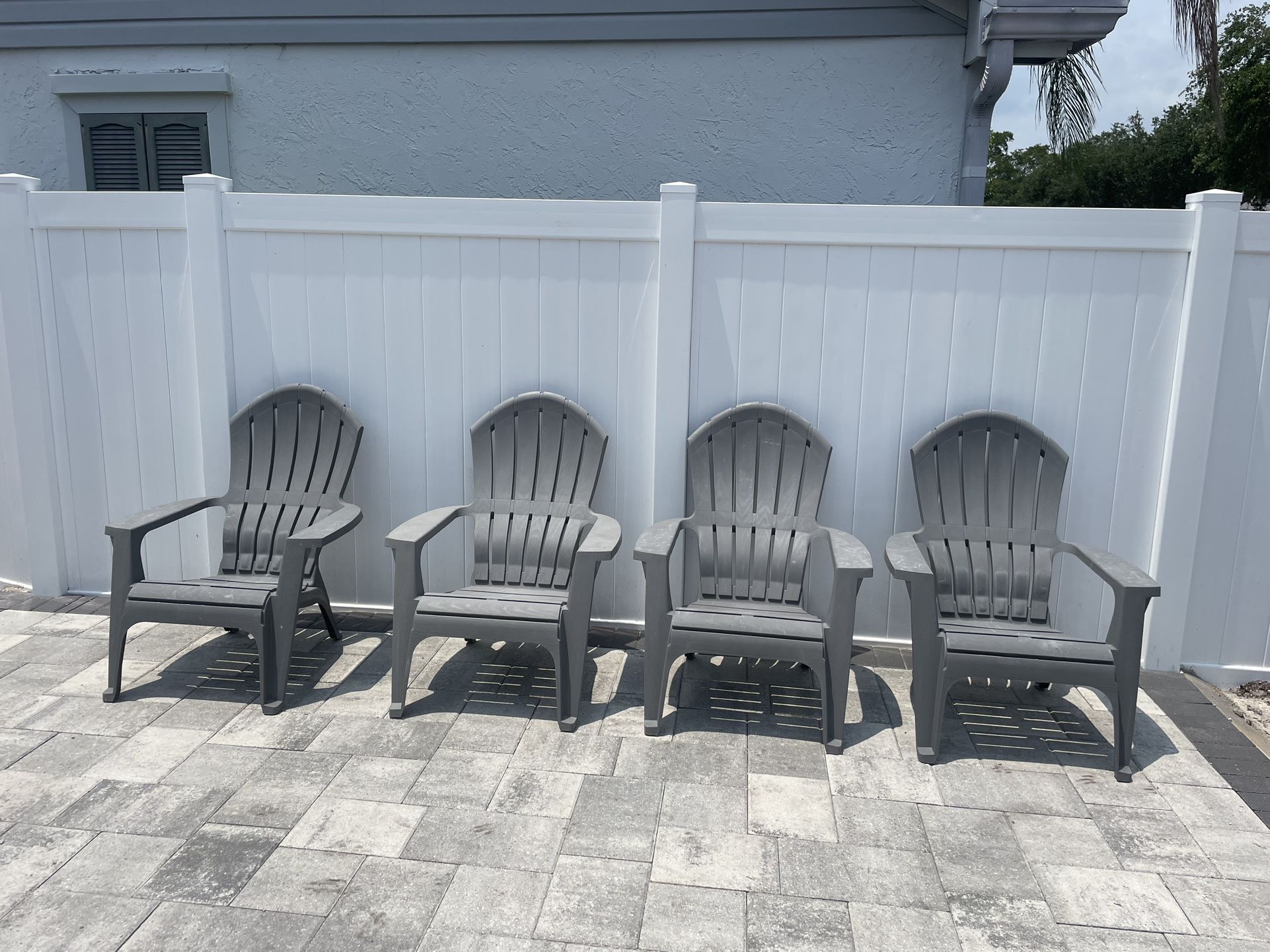 Set of Four Plastic Adirondack Chairs 