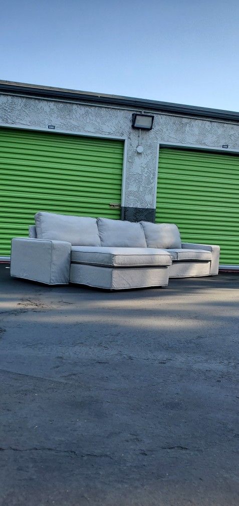 Stunning Low-profile Light Gray Sectional (FREE Assembly and Delivery)  All NEW Upholstery Covers. 