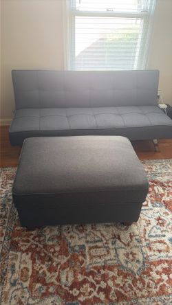 Futon and ottoman very nice like new