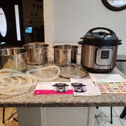 INSTANT POT DUO PLUS 9-IN-1 ELECTRIC PRESSURE COOKER WITH EXTRAS ..2EXTRA POTS AND EXTRA SEALS
