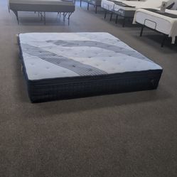 Floor model king size coil mattress soft feel