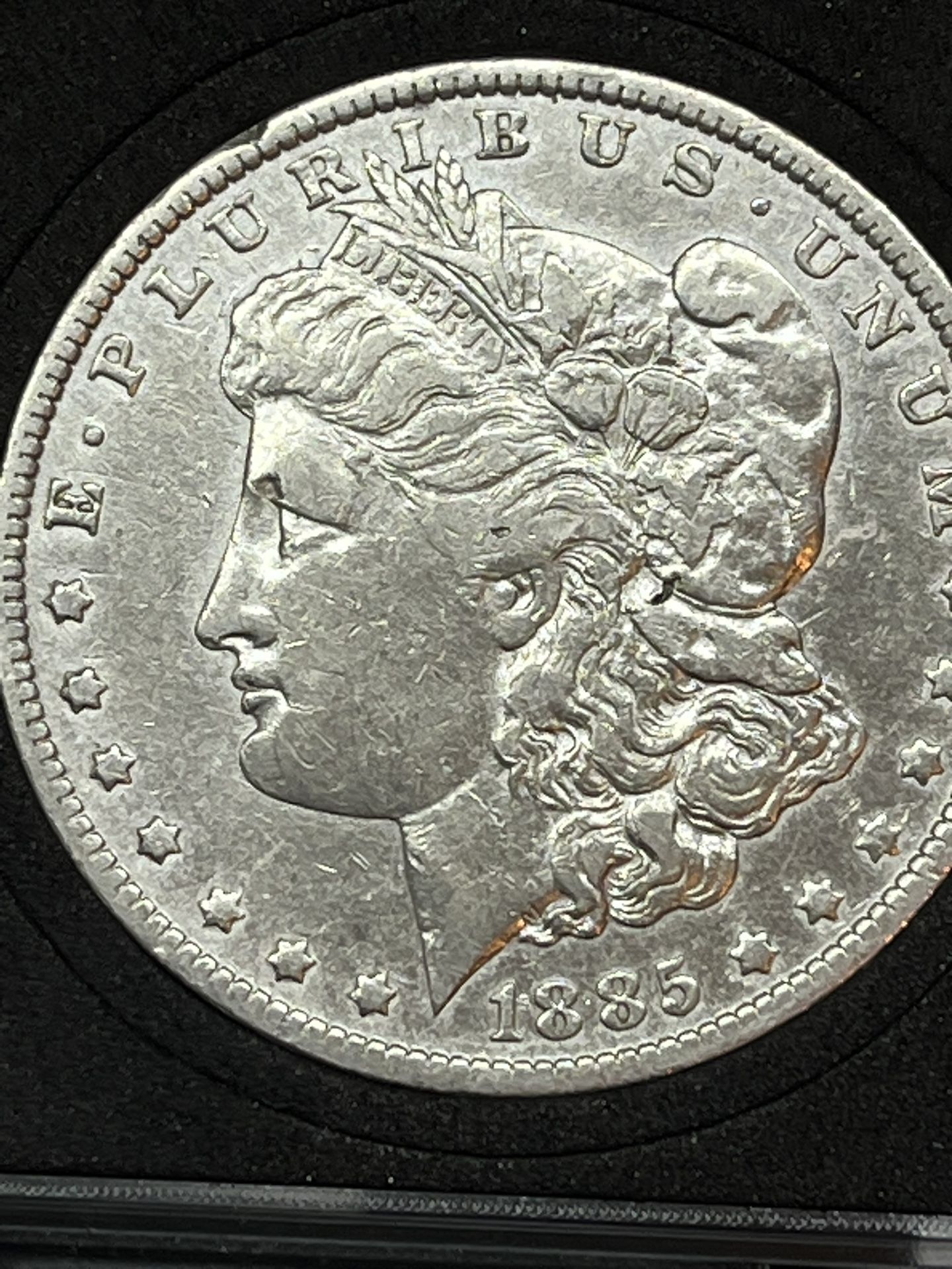 1885-O MORGAN SILVER DOLLAR
