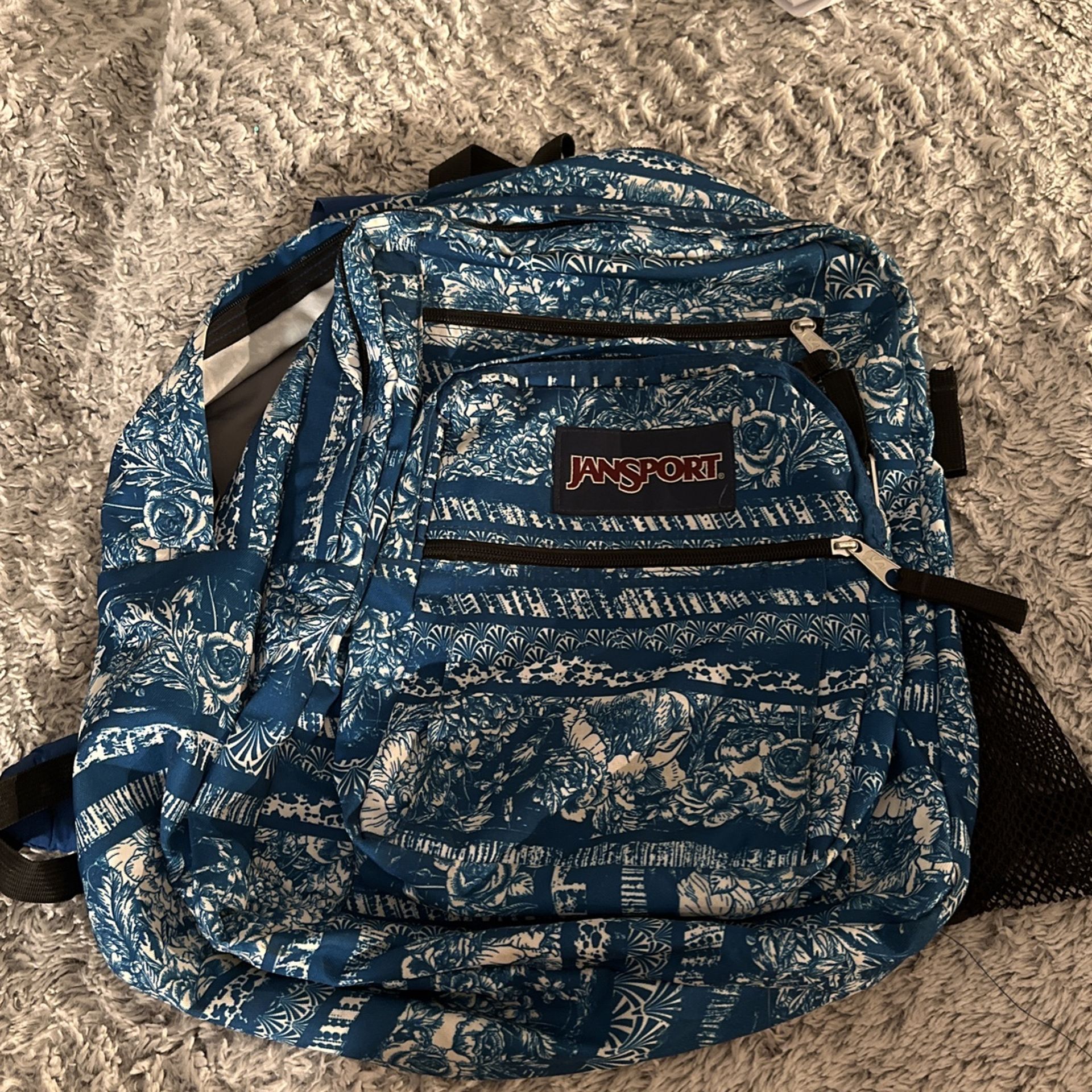 Blue & white Jansport backpack