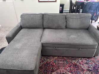 Ashley Furniture Grey Pullout sectional couch
