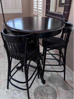 bar table with 3 solid stools