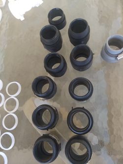 10 qty 1 1/2" diameter black ABS adapter fittings
