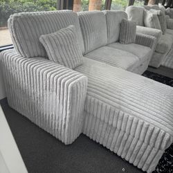 Reversible sectional w/Pull out bed lowest Priced Guaranteed.  