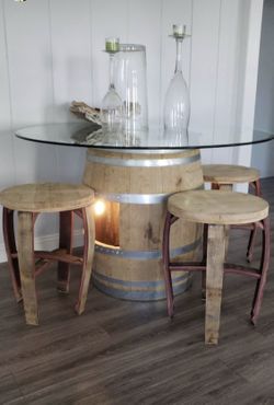 Wine barrel table with barstools for sale new never used .. no glass included $$400