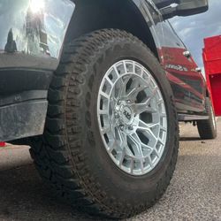 18x9 XM Wheels And Tires 275/65/18 AT
