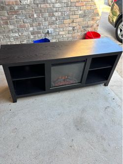 Black fire place TV stand