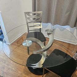 48 Round Glass table with chairs ($30 Delivery)