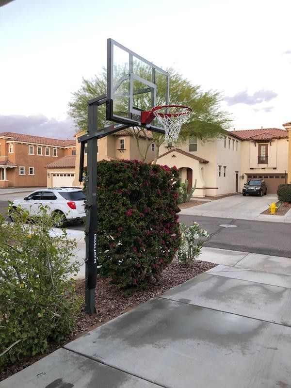 Goaliath 54 inch in ground basketball hoop, adjustable basketball court
