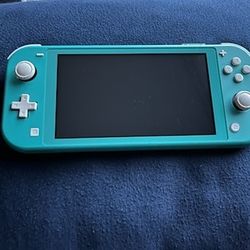 Nintendo Switch Lite w/ Games