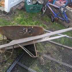 Antique Wheelbarrow Cast iron Wheel