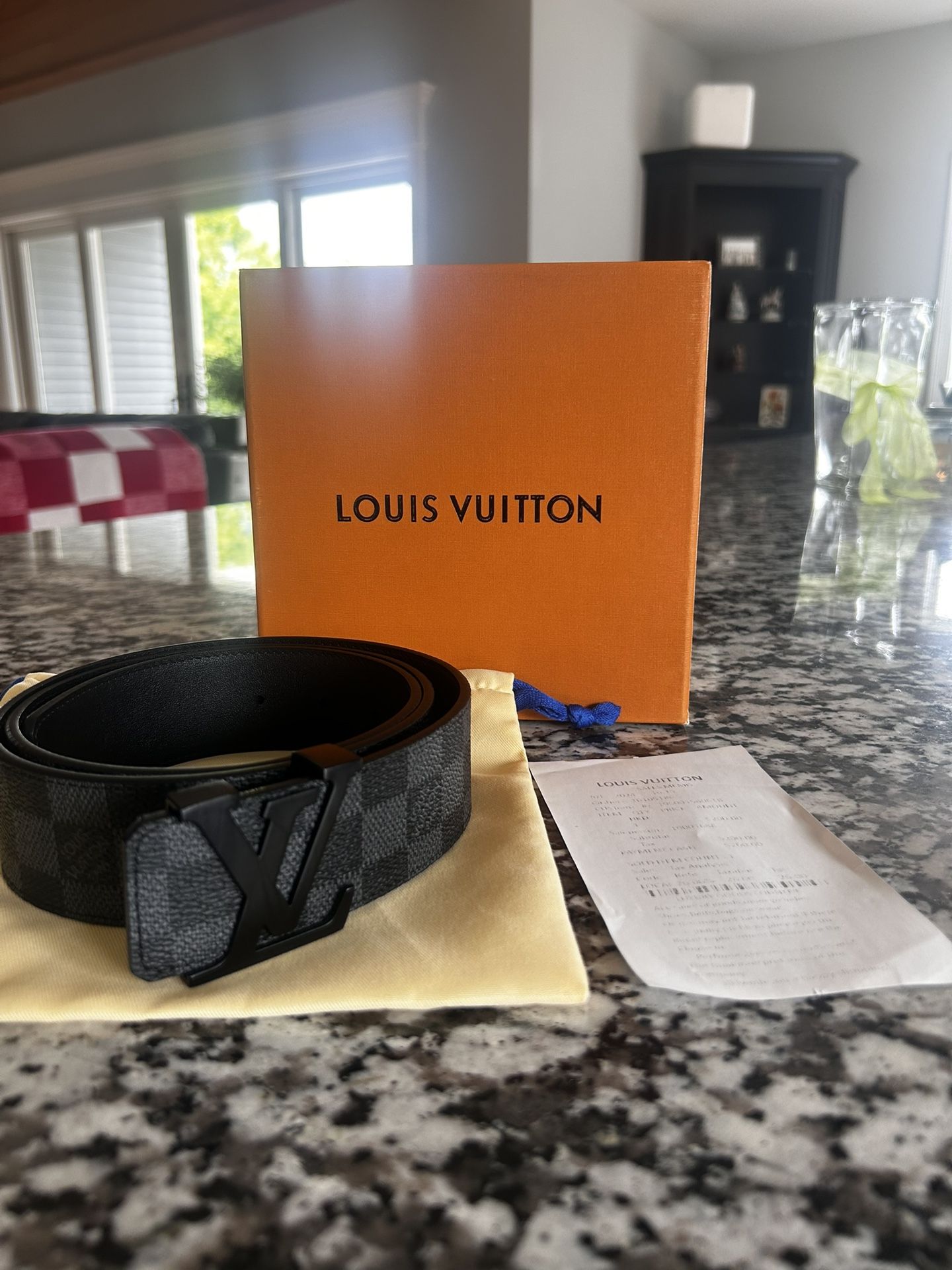 Lois Vuitton Belt (caption)