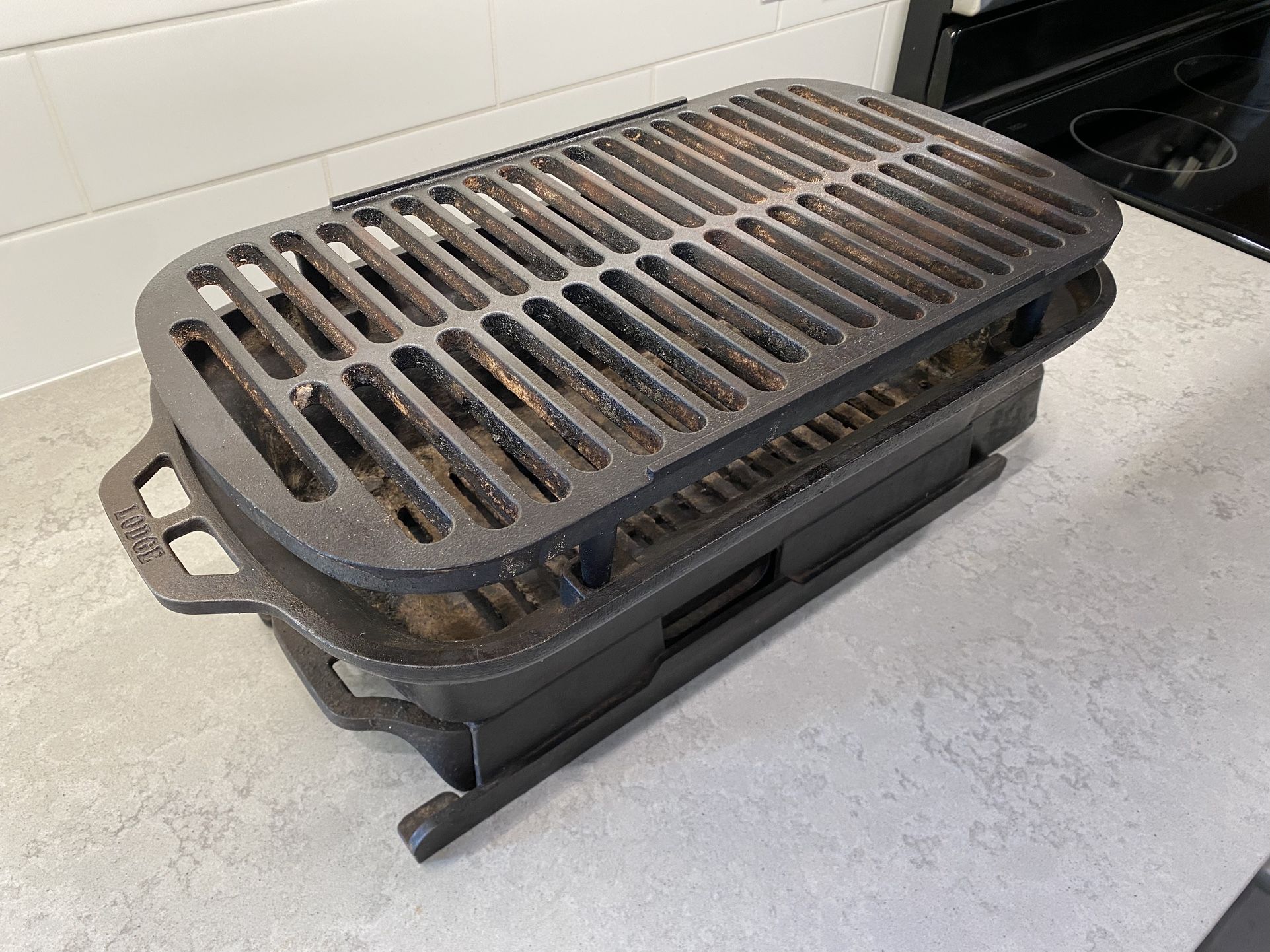 Lodge Sportsman's Cast Iron Pro Grill (charcoal and chimney included)