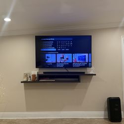 Floating TV shelf 