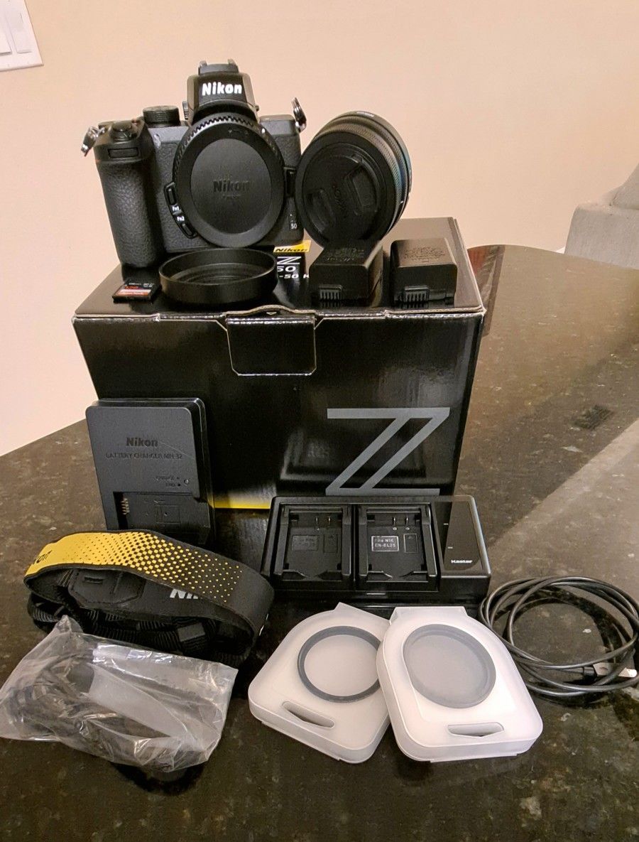 Nikon Z50 Mirrorless 4K Camera + NIKKOR Z DX 16-50mm f/3.5-6.3 VR Lens + extra battery and more