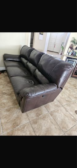 Brown faux leather recliner couch