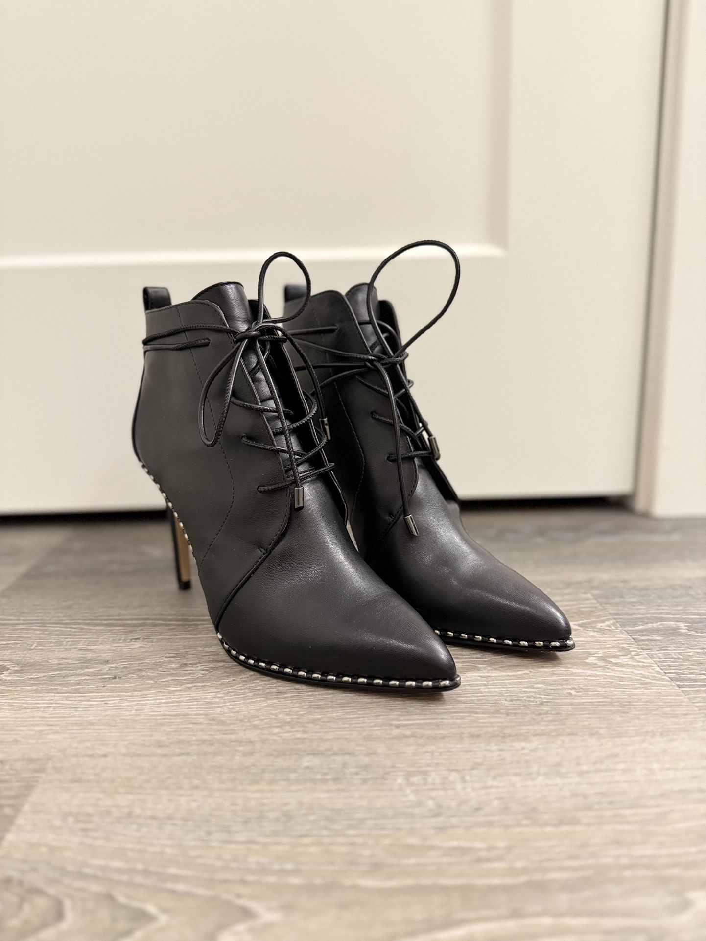 Black leather lace-up ankle boots