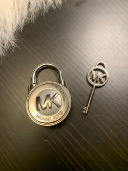 Authentic Michael Kors new lock with key