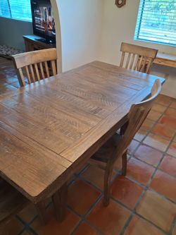 36x72 in table with upholstered bench and two 12-in leaves