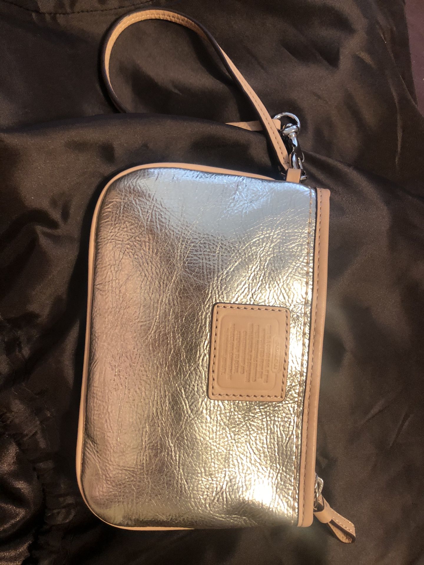 Coach wristlet gold brand new