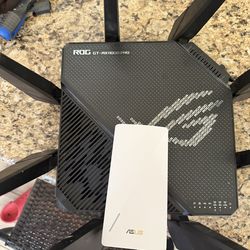 ROG GT-AX11000 Pro Router and Asus RP-AX58 WiFi extender