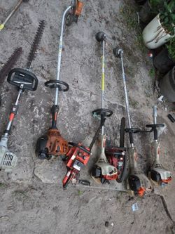 Collection of garden tools including trimmers and chainsaws need carborator clean selling  for $340 Located Mount Dora Fla 32757
