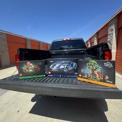 Lego ford gt, Winnie the Pooh, and flowers lot