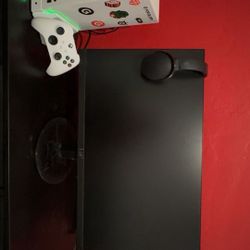 Xbox One Series S With A Controller And Monitor 